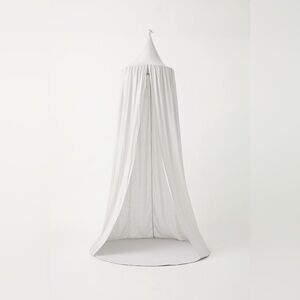 Linen canopy hanging reading nook in pale grey